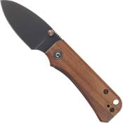 Baby Banter Folding Knife - Green Micarta Handle: Experience the elegance and functionality of this folding knife with a striking green Micarta handle.